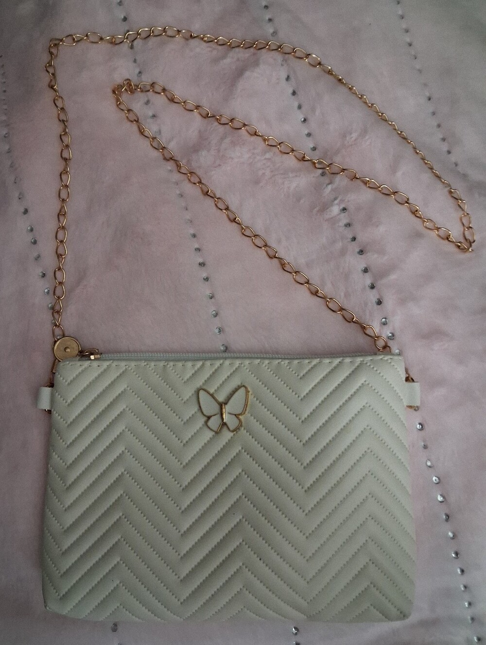Cream Quilted Crossbody Bag with Gold Butterfly Detail